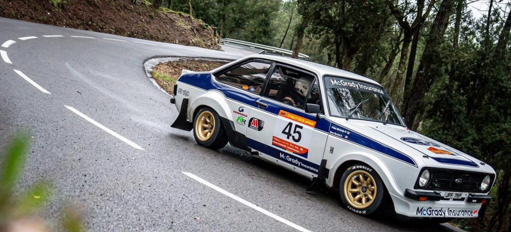 Fintan McGrady's Ford Escort on a rally stage
