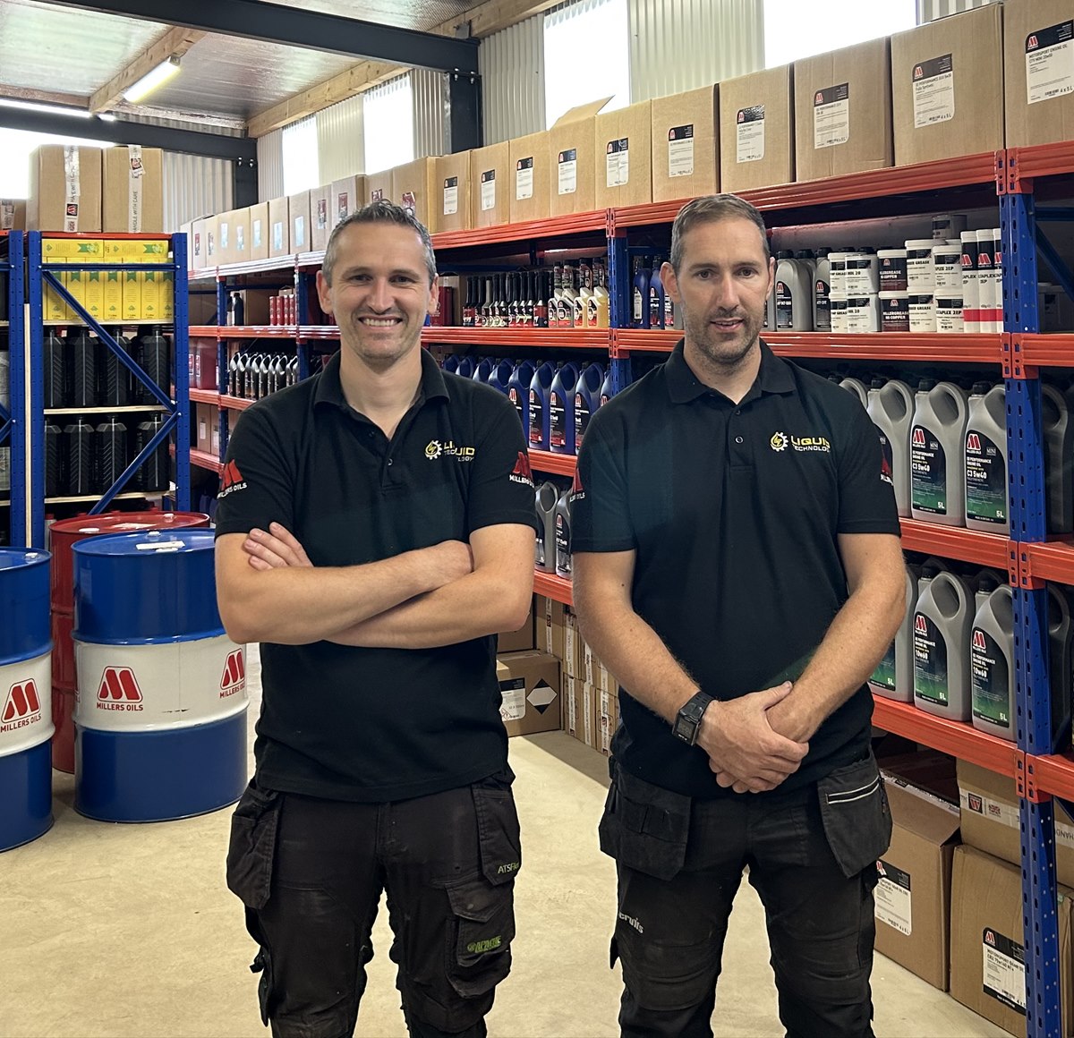 Shane and Tom Stafford with Peter Kendrick in front of Millers Oils stock at Liquid Technology, Co. Wexford