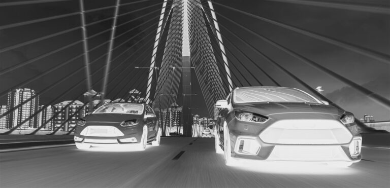 Two performance cars on a bridge — Millers EE Performance engine oil