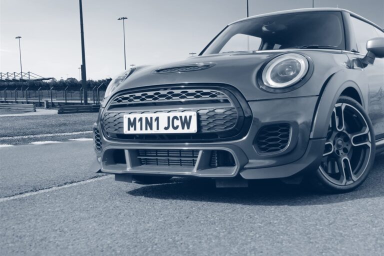 A Mini John Cooper Works performance car on track — Millers Oils