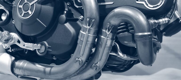 Bent stainless exhaust headers produced on a mandrel tube bender